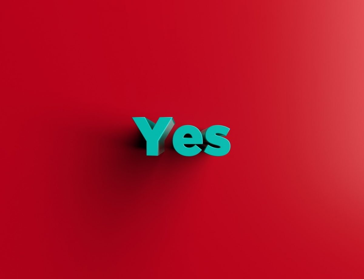 Red Square With The Word Yes Written in Light Blue Color