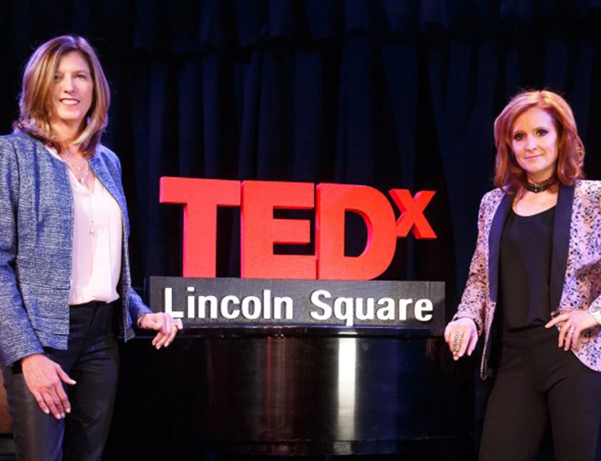 Tricia Brouk With a Fallow Speaker on a TEDx Stage
